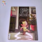 Fred gets Dressed